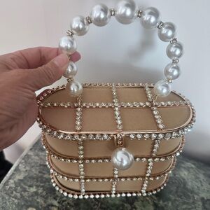 Elegant Pearl Handle Beige Clutch